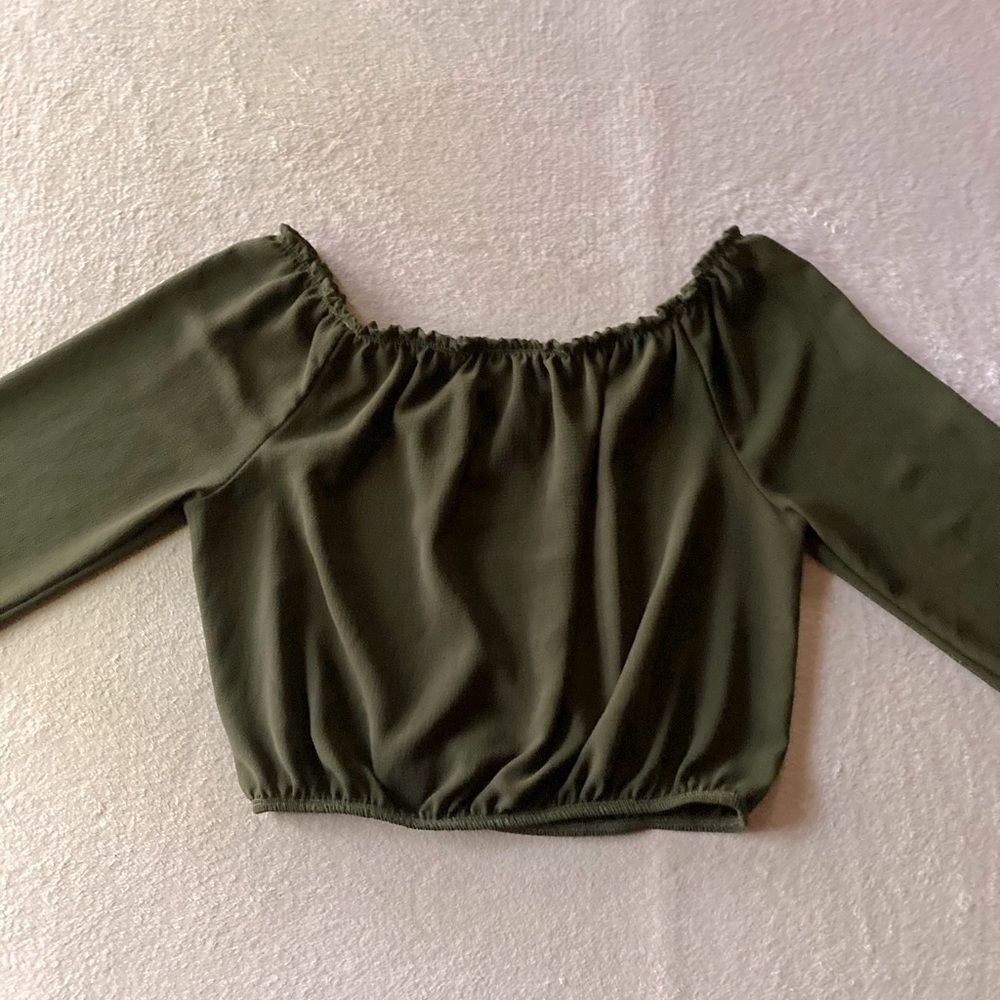 green long sleeved top